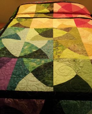 Jazzy Jewels bed quilt by Caroline H.